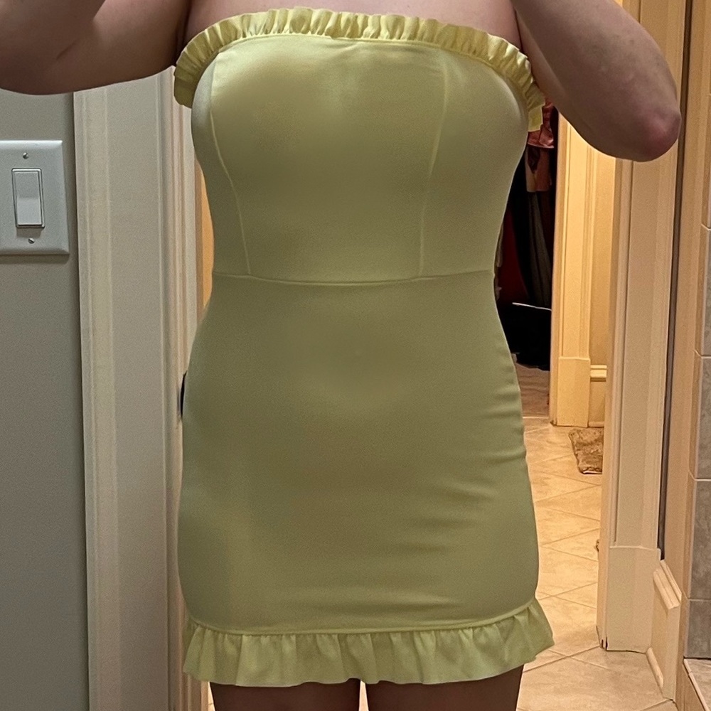 light yellow bodycon with ruffled detailing dress